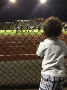 My nephew watching his daddy play football